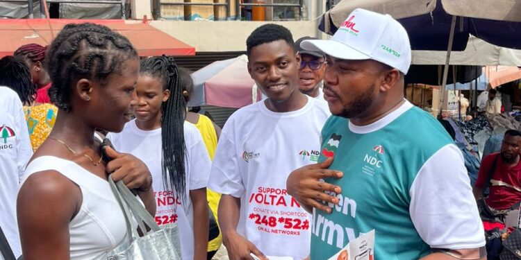 NDC’s Volta Regional Youth Organizer hits HO Market With Mahama’s 24-hour Economy Campaign – PHOTOS